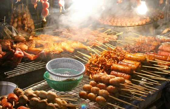 Save money by eating at authentic local street food market abroad